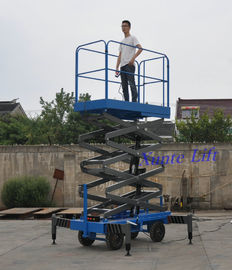Hydraulic Mobile Scissor Lift 6 Meters Platform Height 1 Ton Loading Capacity For Exhibition Hall