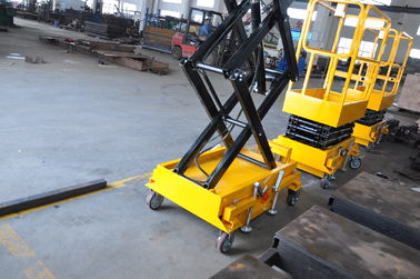 Long Using Period Mini Mobile Scissor Lift With 200Kg Loading And Yellow Color