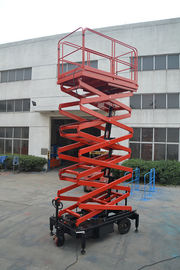 Ware House Using Motorized Scissor Lift 12m platform Height DC Lifting and Moving
